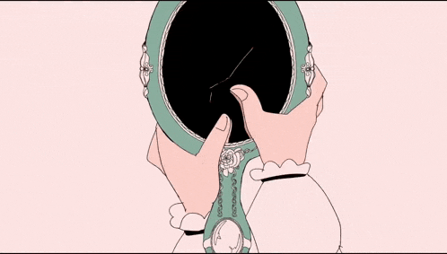 a close up of a person holding a clock in their hands