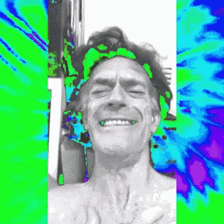 a man without a shirt is making a funny face with a green background .