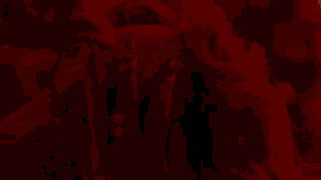 a close up of a person 's torso with a red background .