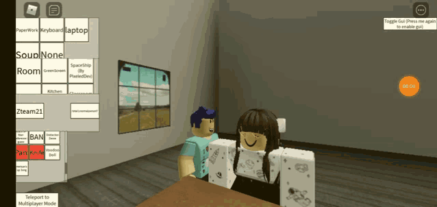 a screenshot of a video game shows a boy and a girl sitting at a table