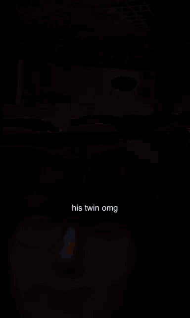 a person is watching a movie with the words his twin omg