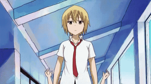 a girl in a white shirt and red tie is walking down a hallway .