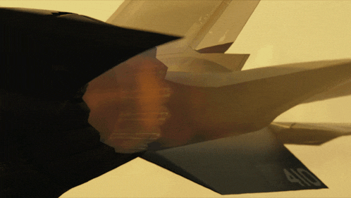 a close up of a fighter jet with the number 400 on the tail