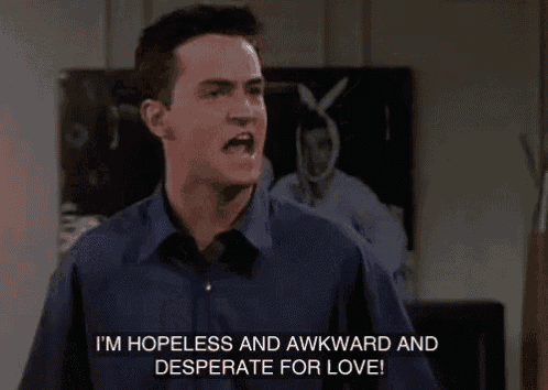 a man in a blue shirt says i 'm hopeless and awkward and desperate for love .