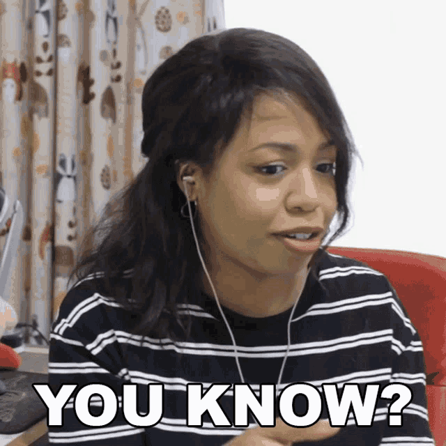a woman wearing headphones says " you know "