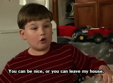 a young boy in a red striped shirt says you can be nice or you can leave my house