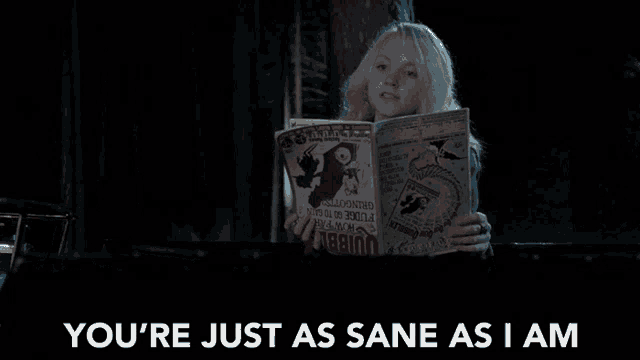 a woman is reading a magazine with the words " you 're just as sane as i am " on the bottom