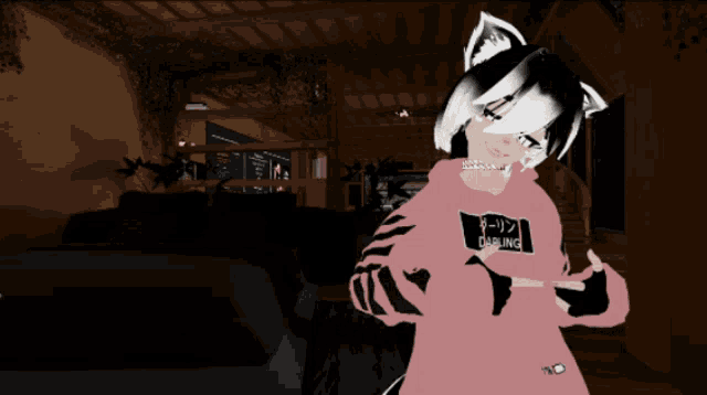 a girl wearing a pink darling hoodie stands in a dark room