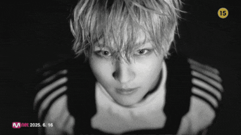 a black and white photo of a man with the number 15 on his head