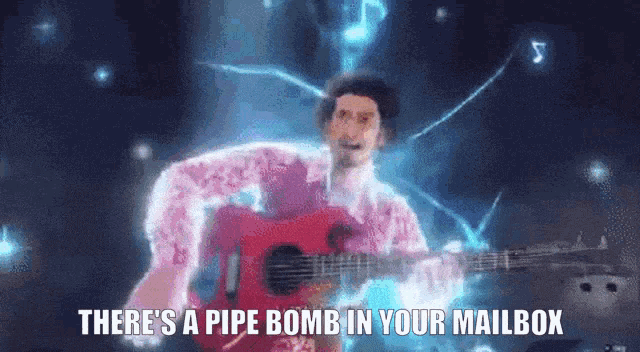 a man in a pink shirt is playing a guitar with the words there 's a pipe bomb in your mailbox below him