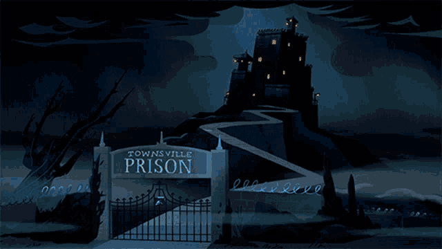 a sign that says townsville prison on it in front of a castle