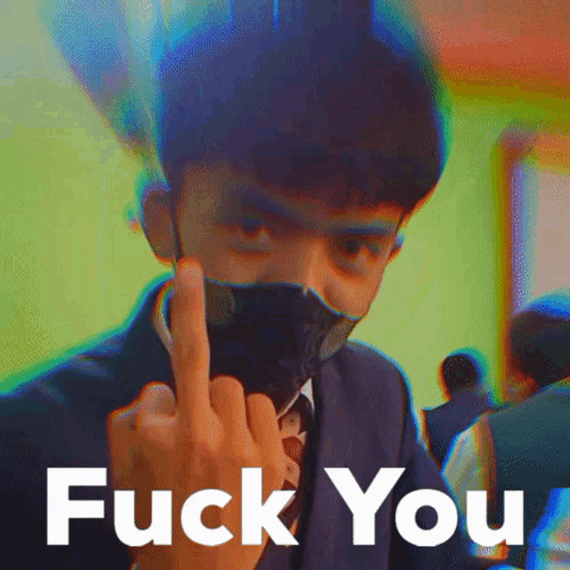 a man wearing a mask is giving the middle finger with the words fuck you written below him