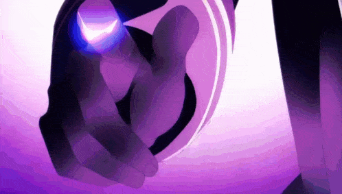 a close up of a person 's hand holding a purple object with a light coming out of it .