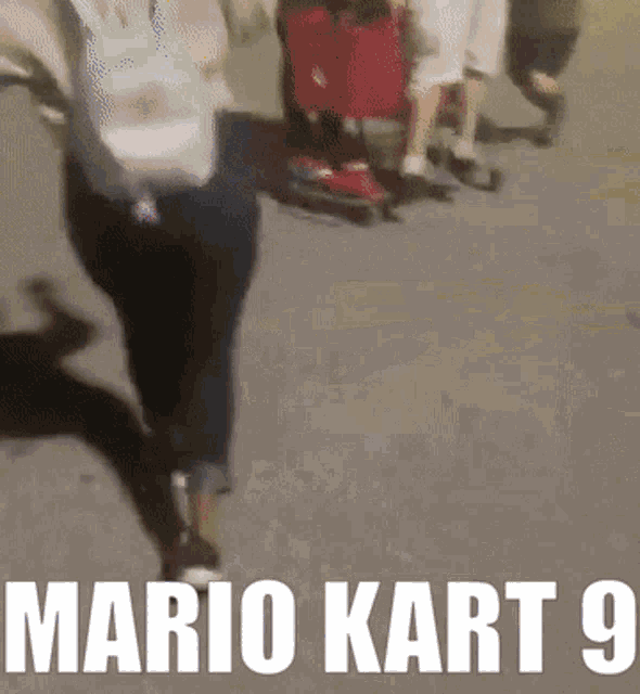 a person walking down a street with the words mario kart 9 written on the bottom