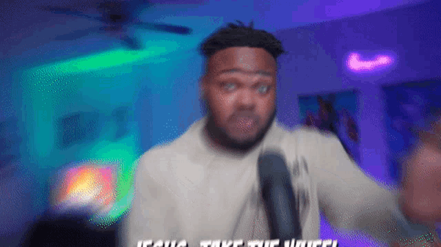 a blurry picture of a man with the words " jesus take the hour " written on the bottom