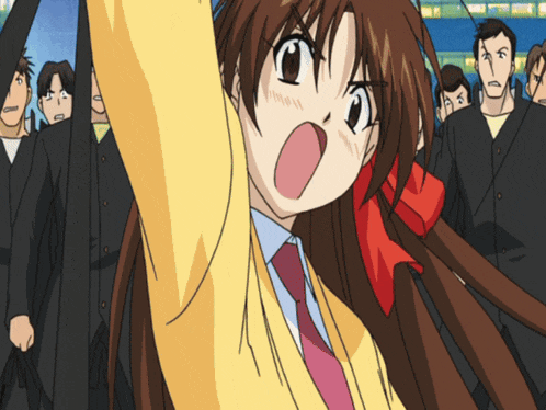 a girl with a red bow in her hair is standing in front of a crowd