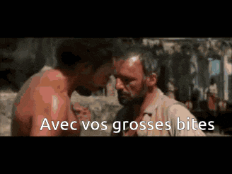 two men are kissing with the words avec vos grosses bites in the corner
