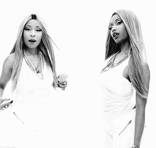 a black and white photo of a woman in a white top