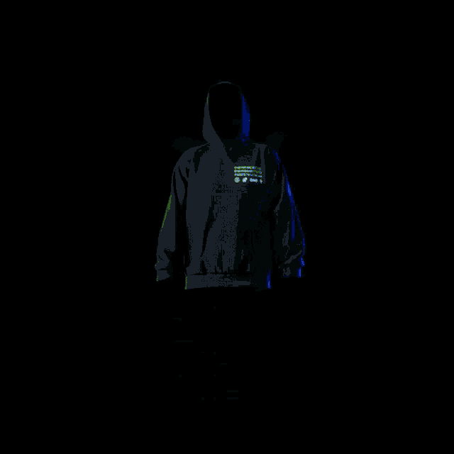 a neon yellow adidas tracksuit is glowing in the dark against a black background