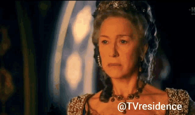 a woman with a tiara on her head and the words @tvresidence on the bottom right