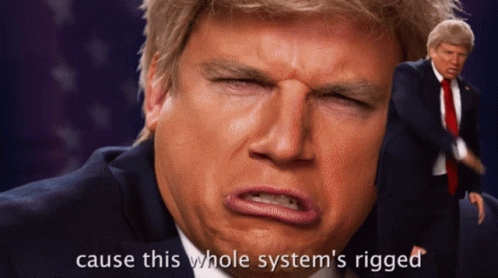 Cause This Whole Systems Rigged And We All Know The Riggers Donal Trump Vs Hillary Clinton GIF - Cause This Whole Systems Rigged And We All Know The Riggers Donal Trump Vs Hillary Clinton Erb GIFs