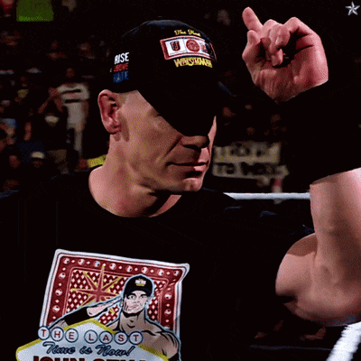 a man wearing a black shirt with the name john cena on it