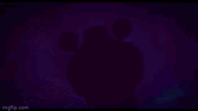 a close up of a person 's head with lightning bolts coming out of it .