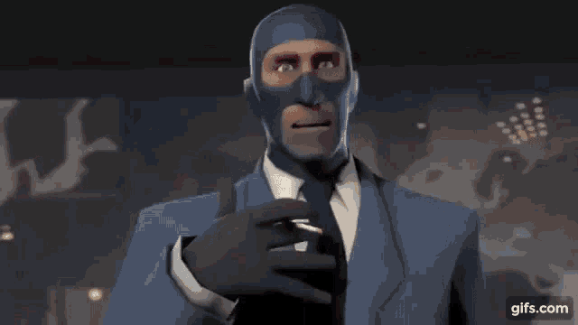 a man in a suit and tie with a blue mask on his face