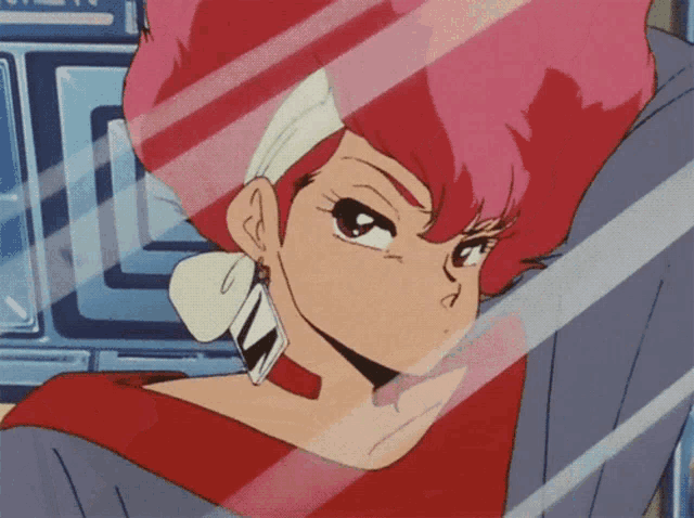 a girl with pink hair and earrings is behind a glass
