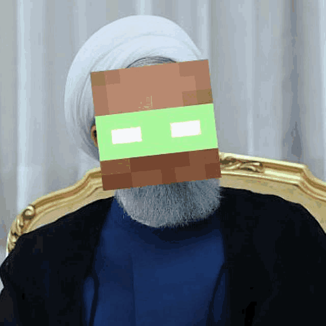a man with a beard and a white turban has a minecraft mask on his face