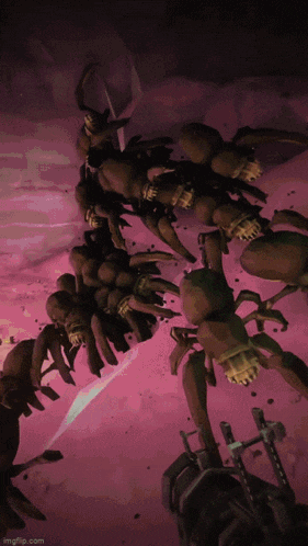 a bunch of spiders are flying through a pink background