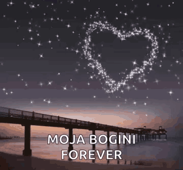a bridge over a body of water with a heart made out of stars