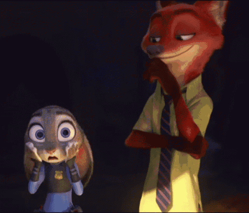 a fox and a rabbit standing next to each other