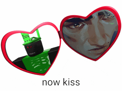 a heart shaped mirror with a picture of a man in it
