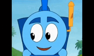 a close up of a blue cartoon train with big eyes and a smile .