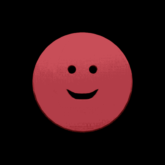 a red circle with a smiling face cut out of it