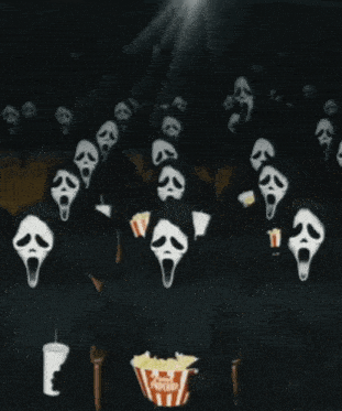 a group of people in scream masks watching a movie