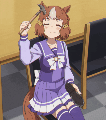 a girl in a purple school uniform is holding a hammer