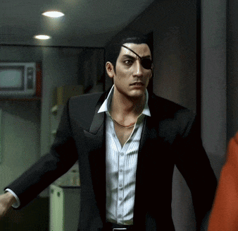 a man in a suit has a bandage on his eye