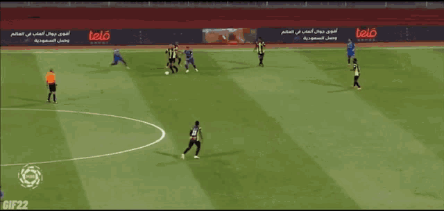 a group of soccer players are playing on a field with a gif22 watermark