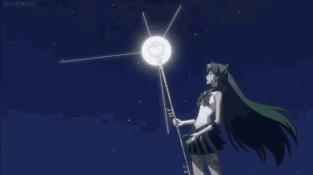 a girl with green hair is standing in front of a white ball with a heart on it in the sky .