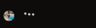 a blurry picture of a person standing in a dark room with a circle in the middle .