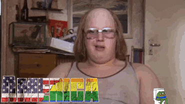 a bald man wearing glasses and a tank top is standing in a room with a frog on the wall .