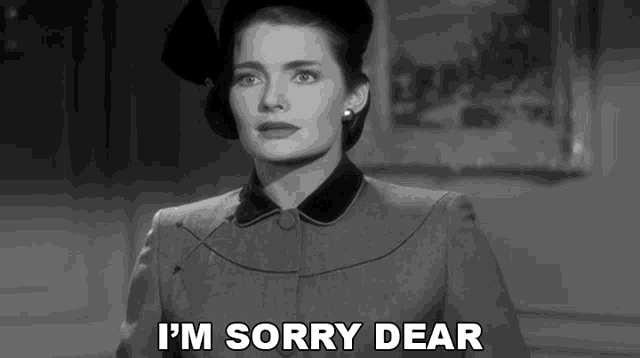a woman in a hat says i 'm sorry dear in a black and white photo