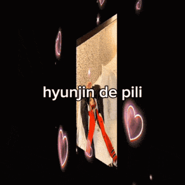 a picture of a person laying on a bed with the name hyunjin de pili on it