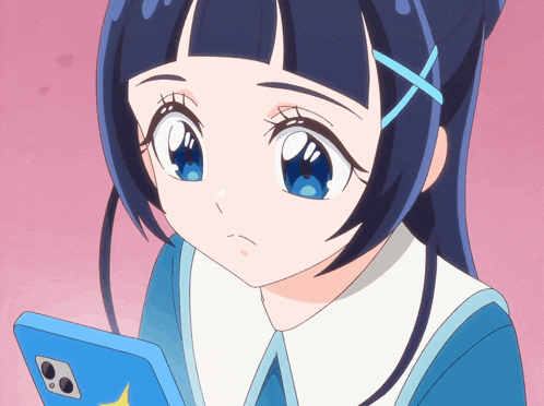 a girl with blue hair is looking at a cellphone
