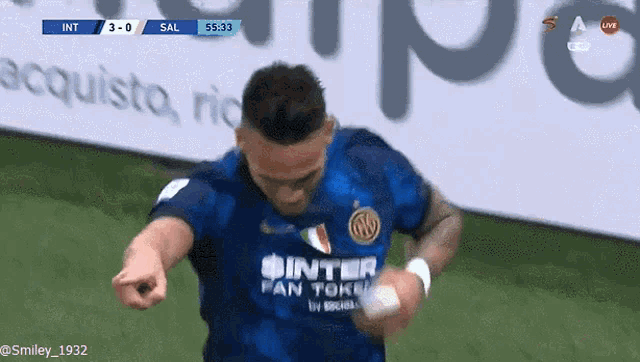 a soccer player wearing a jersey that says inter fan tokyo on it