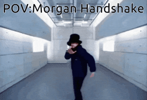 Morgan Handshake GIF - Morgan Handshake Inflict Wounds GIFs