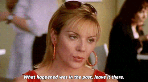 a woman in a red dress is talking about what happened in the past
