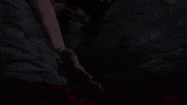 a close up of a person 's hands with a ring on